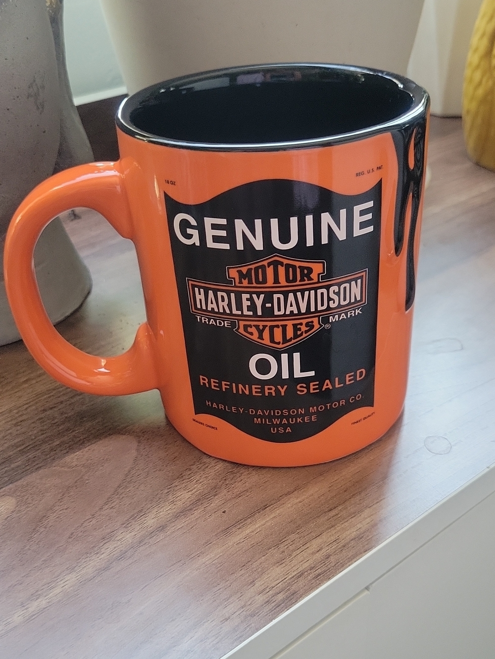 Harley-Davidson Orange and Black Ceramic Coffee Mug with 'Genuine Oil' Logo